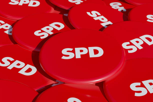 SPD - Social Democratic Party of Germany SPD - Social Democratic Party of Germany. Some political badges, campaign button on the table. Democratic party, opposition, german government. 3D illustration social democratic party stock pictures, royalty-free photos & images