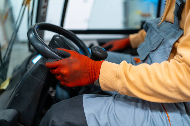 istock Close up shot of an unrecognisable worker driving forklift 2031270519