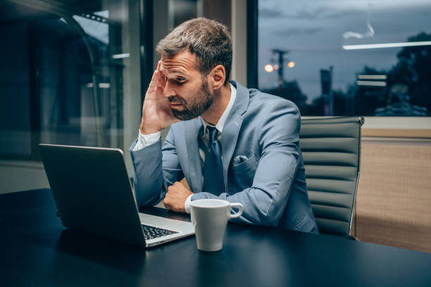 istock Businessman working late in the office. 2031282845