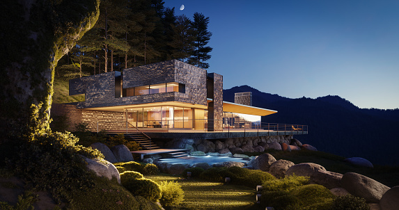 Digitally generated modern villa perched on a mountain side illuminates the twilight with its warm interior lights. The exterior of the house blends stone and glass, complementing its natural surroundings. A tranquil pool reflects the last light of day, enhancing the serene atmosphere.\n\nThe scene was rendered with photorealistic shaders and lighting in Corona Renderer 11 for Autodesk® 3ds Max 2024 with some post-production added.