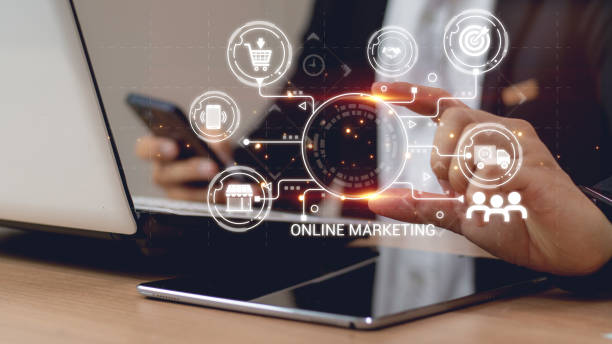 istock businessman hand working with laptop computer, tablet and smart phone in modern office with virtual icon diagram at modernoffice, Digital Marketing, laptop using ,Social, media, Marketing concept. 2031316613