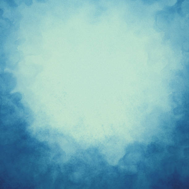 istock blue texture background with abstract watercolor sky design, pastel light blue green color center and dark stormy border of clouds, cloudy smoke frame 2031348991