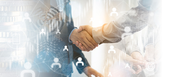 Double exposure of business handshake for successful of investment deal background, teamwork and partnership concept.connections concept.