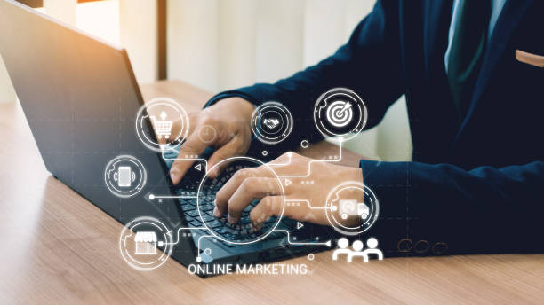 istock businessman hand working with laptop computer, tablet and smart phone in modern office with virtual icon diagram at modernoffice, Digital Marketing, laptop using ,Social, media, Marketing concept. 2031375439