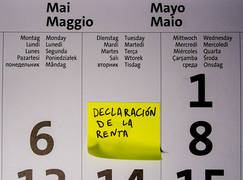 Calendar pointing at April 7th 2024, Tax Day in Spain for 2023 earnings. First date to do telephone income statement without draft for Declaracion de la Renta. High quality photo