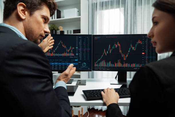 istock Business traders discussing on dynamic stock risk or profit point. Postulate. 2031475401
