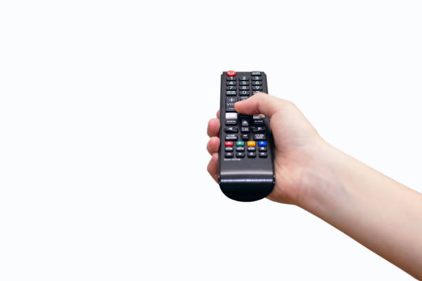 istock A human hand holds a TV remote control on a white background and presses a button 2031478506