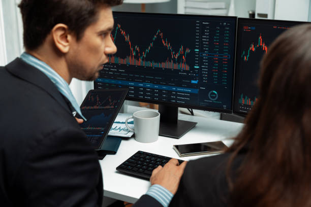 istock Business traders discussing on dynamic stock risk or profit point. Postulate. 2031512094