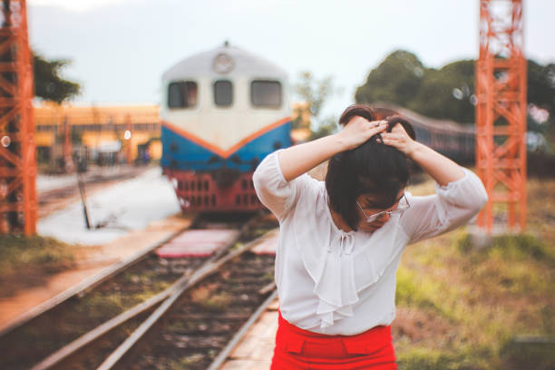 istock short asian woman in white 2031541028