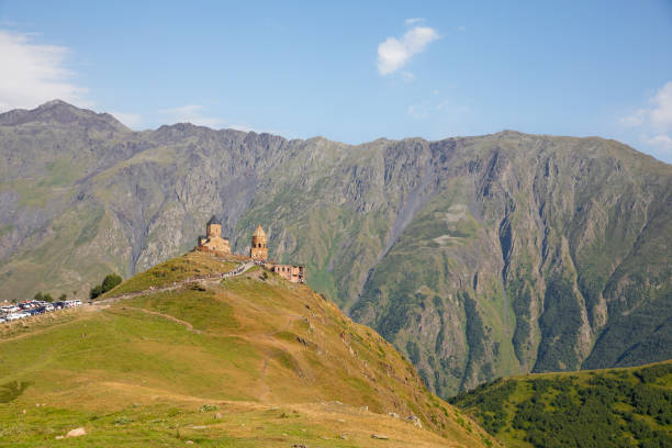 istock Gergeti Trinity Church with view of  Caucasus mountains 2031558892