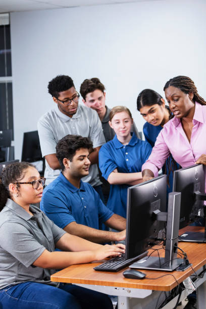 istock High school students and teacher in computer lab 2031588814