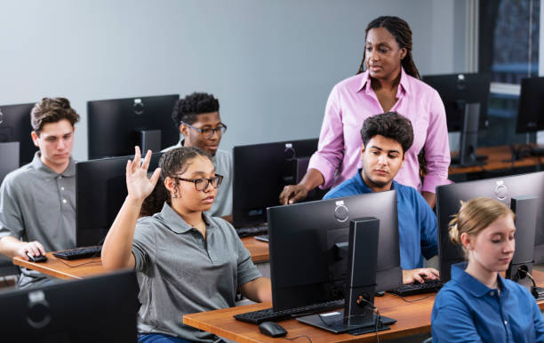 istock High school students and teacher in computer lab 2031589365