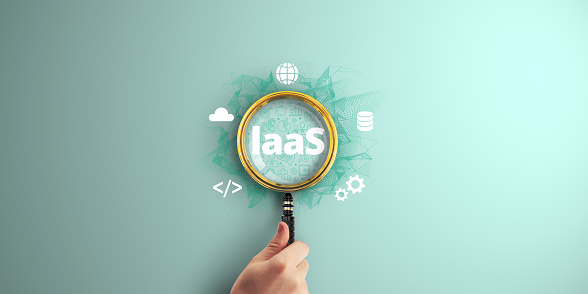 laaS. Infrastructure as a Service. Empowering Software Development with Cloud Components and Internet Technology, with a Lens on Digital Marketing Success. Magnifier focus to Digital marketing icon.
