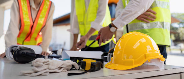 istock Construction concept of Engineer or architect meeting for project working with partner and engineering tools on building and blueprint in working site 2031623781