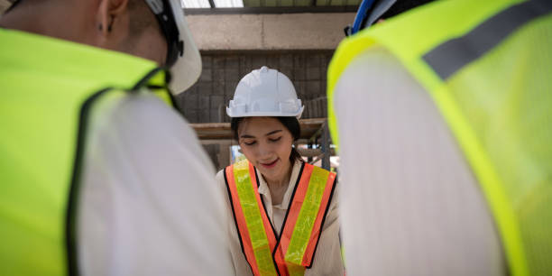 istock Construction concept of Engineer or architect meeting for project working with partner and engineering tools on building and blueprint in working site 2031652508