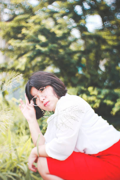 short asian woman in white