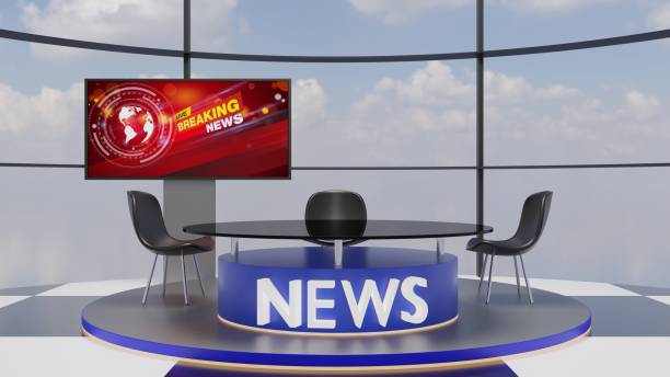 istock glass table and led background in a news studio room.3d rendering. 2031698484