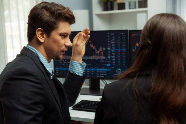 istock Business traders discussing on dynamic stock risk or profit point. Postulate. 2031754139
