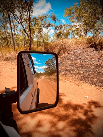 Dirt road reflection in Troopy side mirorr
