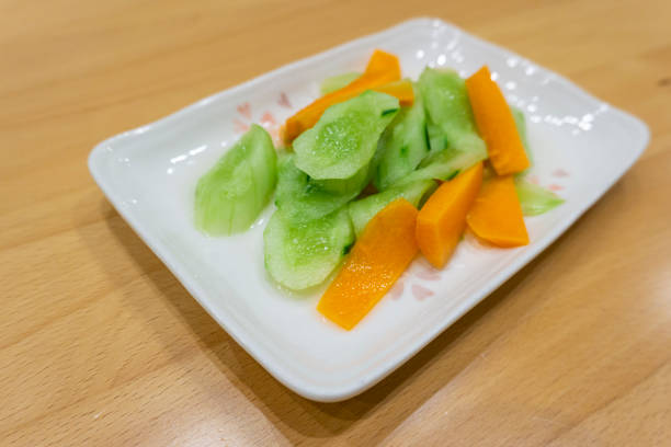 Lightly pickled cucumbers and carrots