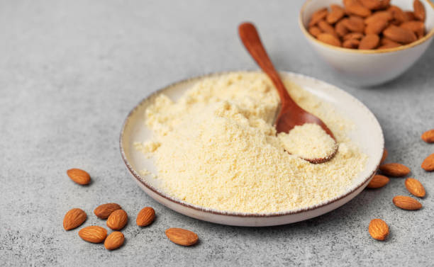 istock Fresh almond flour in a  bowl and almonds 2031926460