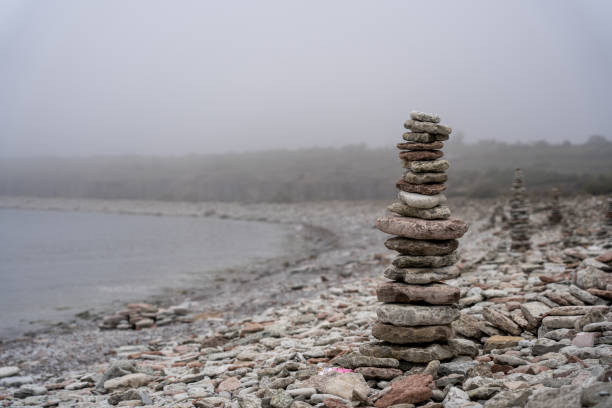 istock Stack of rocks atop a rocky climb 2031932219