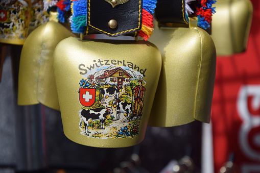 Bells in Switzerland touristic shop are typical symbol.