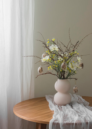 Vase with flowers in the living room