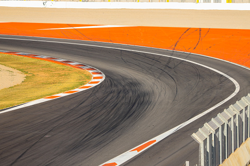 A Competition asphalt in the first curve of the Ricardo Tormo circuit in Cheste, Valencia, Spain