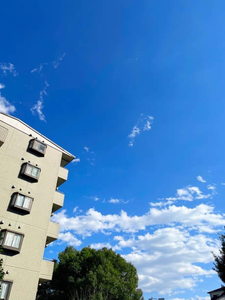 istock Apartment exterior and blue sky 2031968729