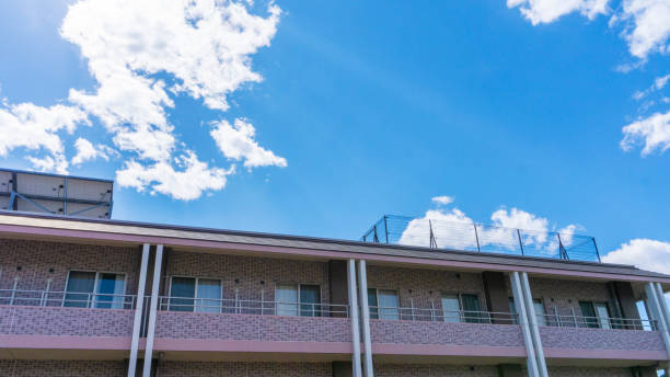 istock Apartment exterior and blue sky 2031974080