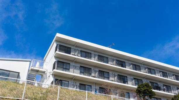 istock Apartment exterior and blue sky 2031978753