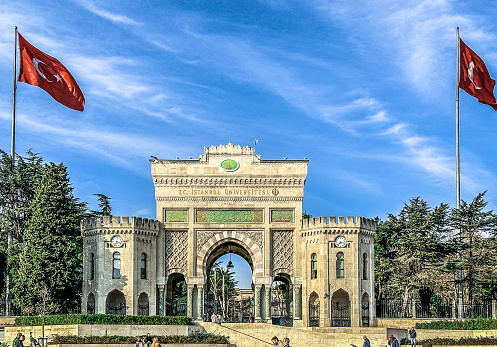 Istanbul, Turkey - February 8, 2024: Photo shows the main campus of Istanbul University with it's landmark front gate near Beyazit Square. Istanbul University is one of the oldest higher education institution found in 15th century.