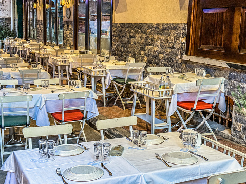 Istanbul, Turkey - February 6, 2024: A restaurant in Beyoglue district near Istikal Ave is ready for customers. In the heart of the city, this neighborhood offers attractive shops, restaurants, bars, cafe, and varieties of nightlife options.