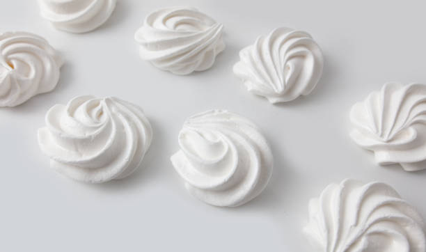 istock Closeup of white creamy marshmallow isolated on white background 2032046902