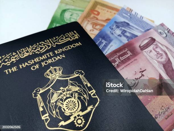 Jordanian Passport And Jordanian Dinar Banknotes Stock Photo Download