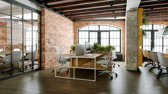Contemporary office environment featuring furniture and plants.