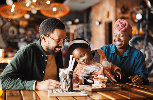 Family, parents and child with dessert at restaurant, time together with dinner and sweet snack. Happiness, bonding and black people at diner with waffles and ice cream for catering and cuisine