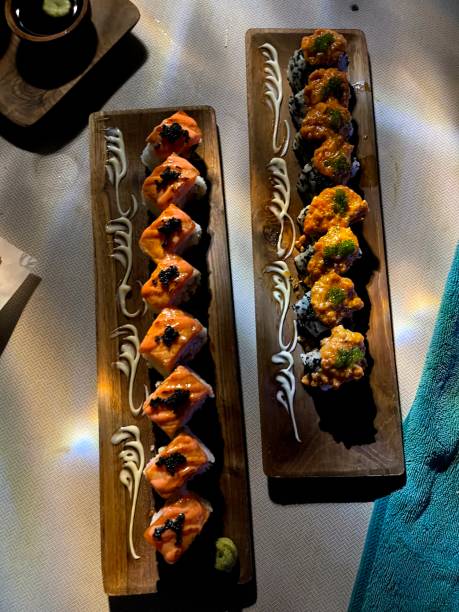 istock Variants Of Sushi Rolls on Wooden Table 2032136853