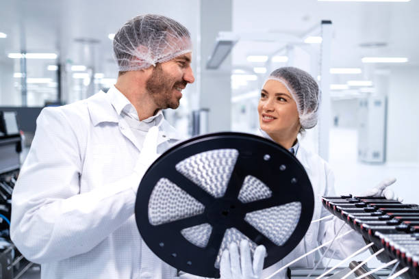 istock Factory employees working together in automotive industry. 2032148616