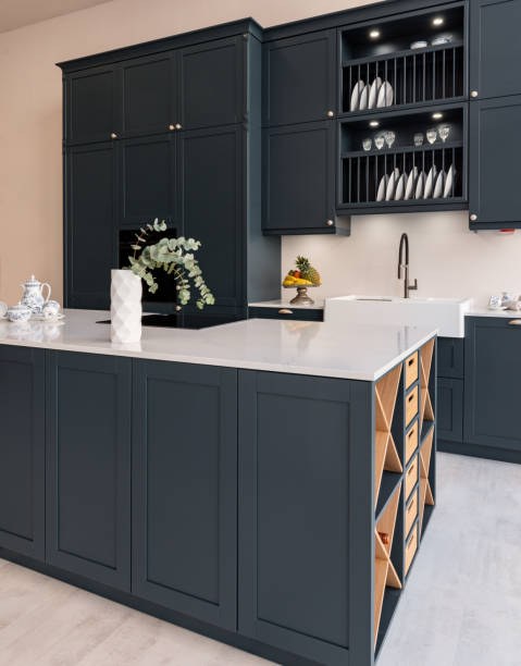 istock A contemporary, chic kitchen featuring stylish dark grey cabinets and white marble countertop 2032157190