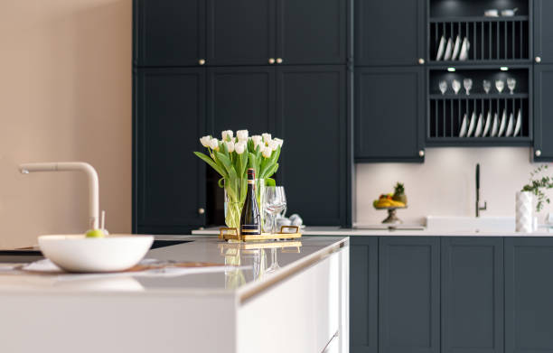 istock Decorations and flowers on marble counter top in kitchen showroom 2032157194