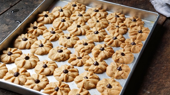 Kue Semprit or Semprit Cookies with chocolate chips on top. These cookies commonly served for Idul Fitri