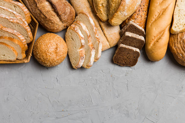 istock Homemade natural breads. Different kinds of fresh bread as background, top view with copy space 2032184522