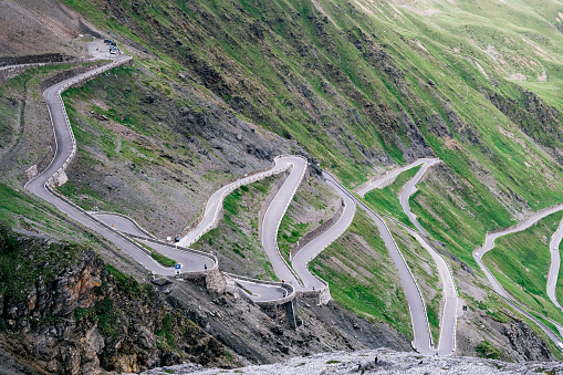 The Stelvio Pass is an Alpine pass in the Rhaetian Alps, as well as the highest automobile pass in Italy, in front of the Agnello pass, and the second in Europe behind the Iseran pass.