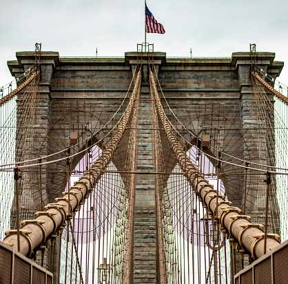 The incredible Brooklyn Suspension Bridge linking the boroughs of Manhattan and Brooklyn in New York City (USA), the largest suspension bridge in the world until 1889.