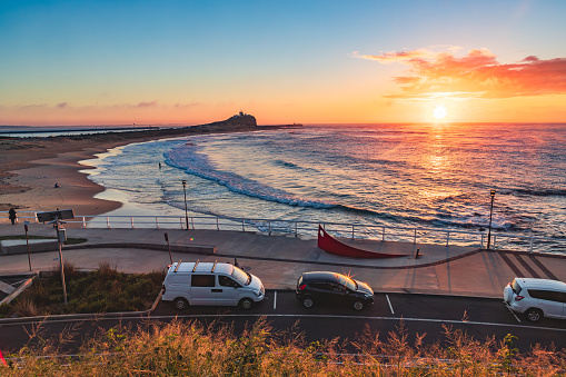 The view of Nobbys Head, Nobbys Beach and Newcastle Breakwater in the sunrise