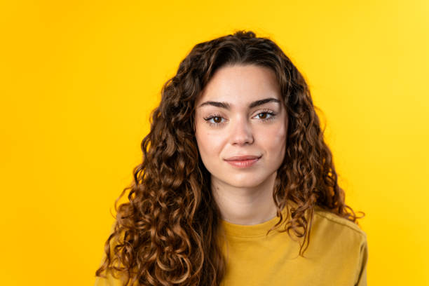 istock Joyful Young Woman on Yellow 2032220320