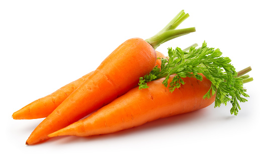 Carrots isolated. Carrot on white background. Carrots with green leaves.