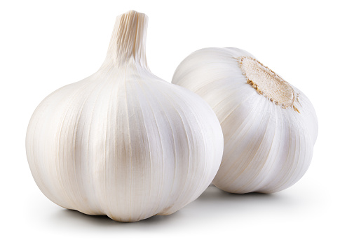 Garlic bulb isolated. Garlic bulbs on white background. White garlic bulb composition. With clipping path. Full depth of field.